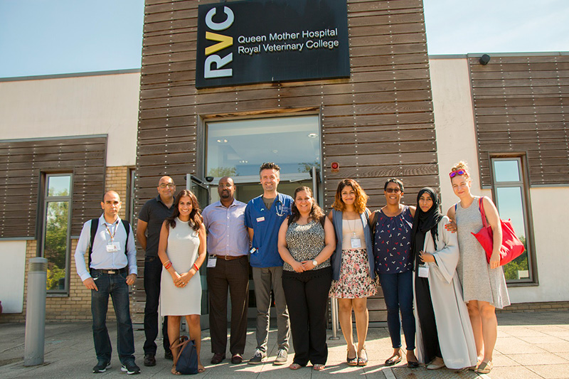 group photo outside hospital building