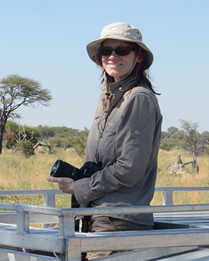 Tatjana Hubel on a vehicle in Africa