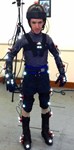 Jockey posing with inertial measurement units attached to various points across his body